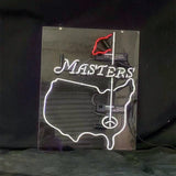 Neon sign on black background showing a white outline of the USA with a red flag and the word 'MASTERS' in white letters above a golf hole design.