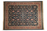 Vintage 9x12 Serapi Indian Soumac design carpet featuring intricate floral and vine patterns on a dark navy field with a coral and beige floral border.