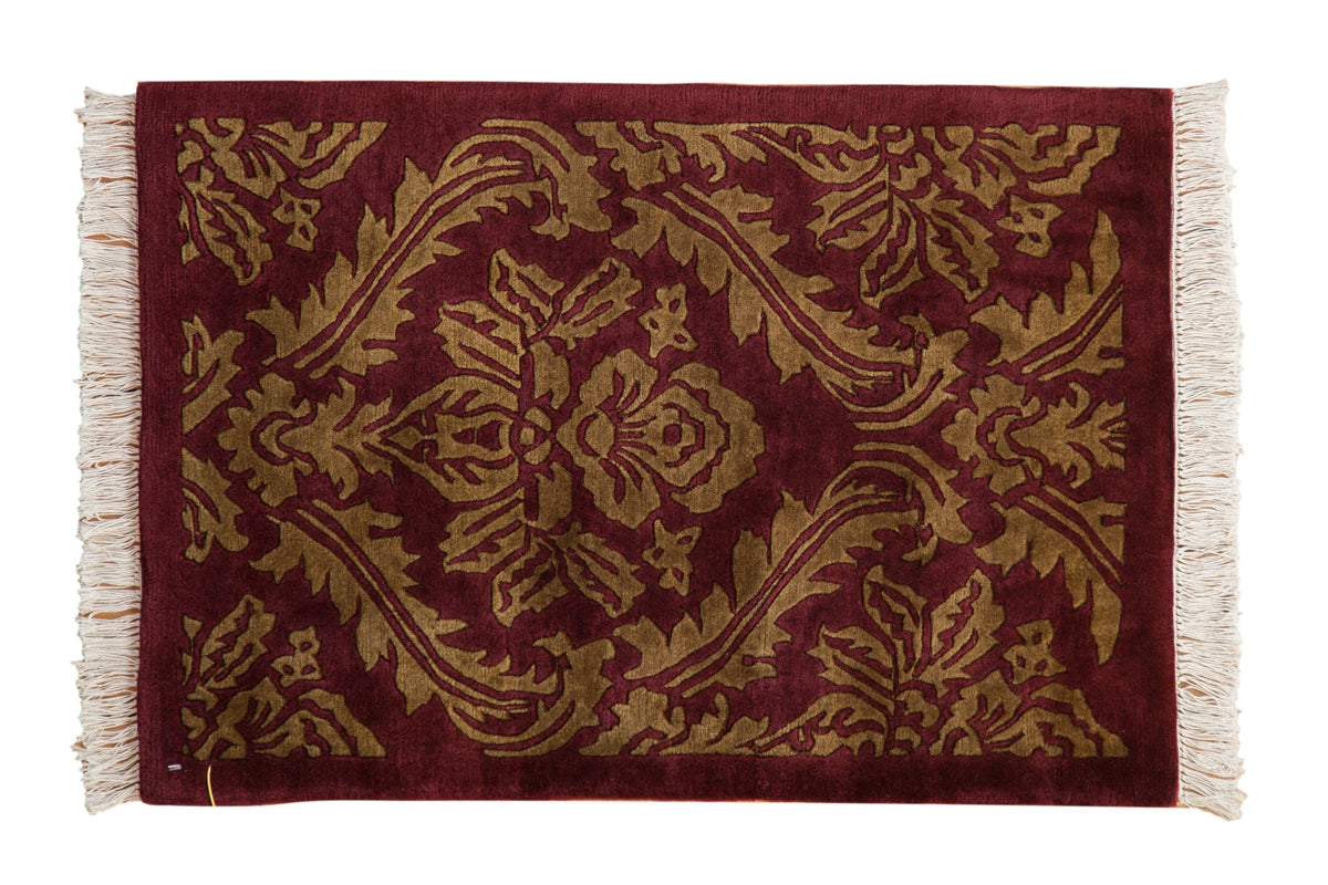 2x3 Vintage Indian Damask Design Rug Mat showing a diamond-shaped panel with vased flower and serrated leaves in burgundy and wine red tones