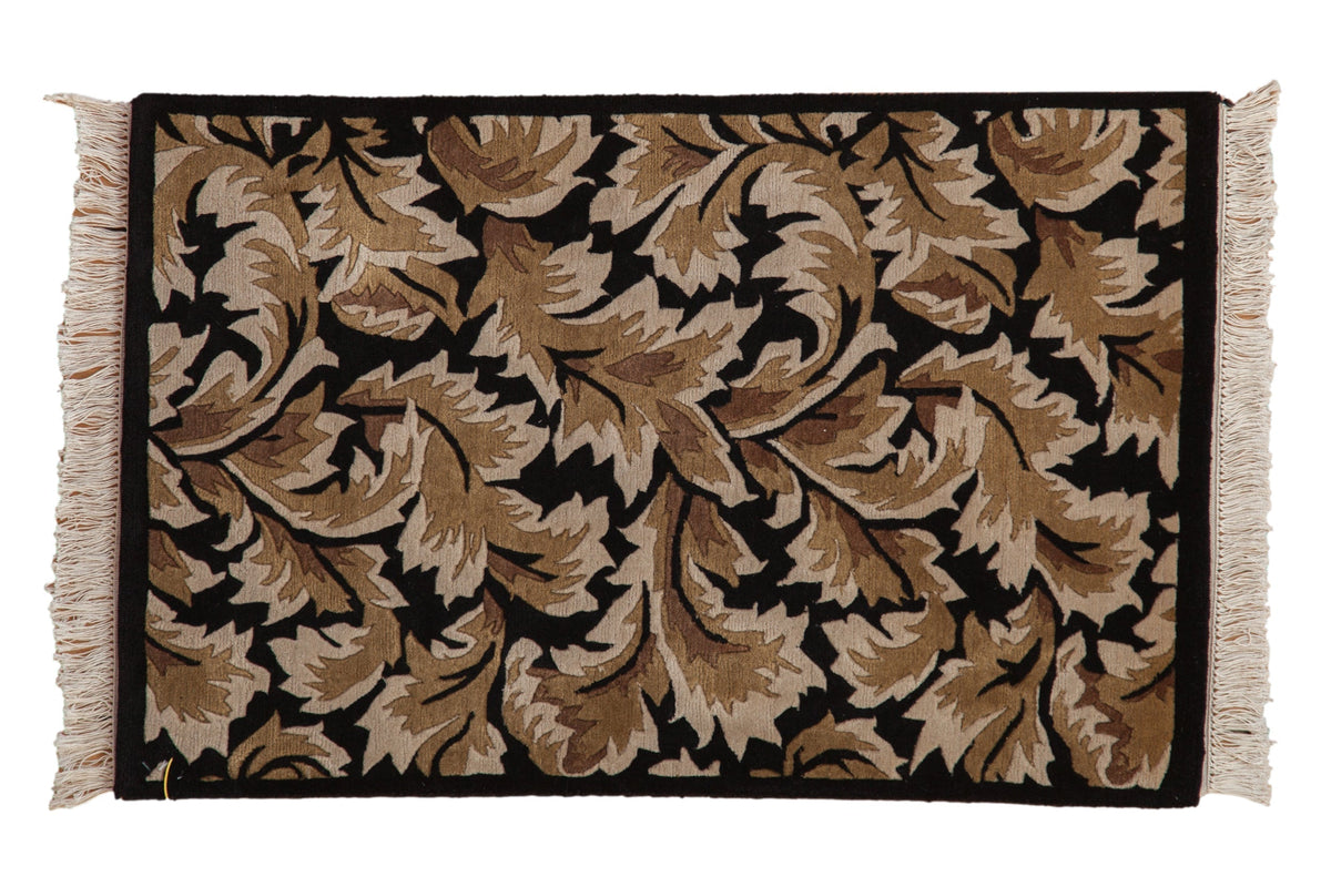 2x3 vintage Indian Arts and Crafts design rug mat showing overlapping leaf pattern in black, beige, and dusty brown tones