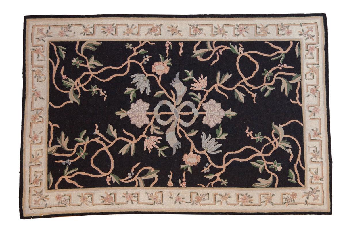 4x6 Vintage Chainstitch Rug showing central floral ribbon and vine pattern in muted colors
