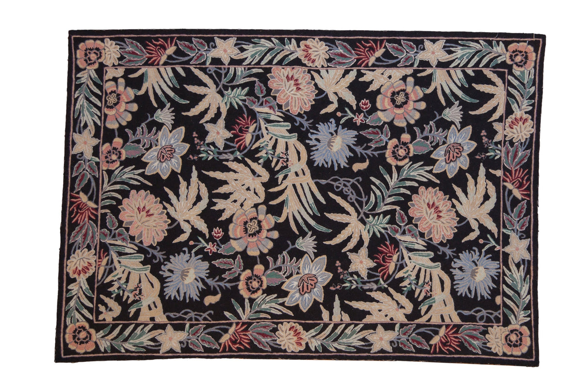 4x6 Vintage Chainstitch Rug with intricate multicolor curvilinear design laid out in a neutral room