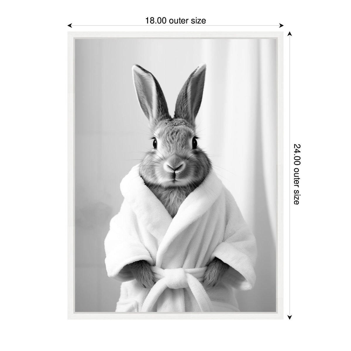 Black and white photo of a rabbit dressed in a white bathrobe, standing against a light, softly blurred background, facing forward with ears upright.