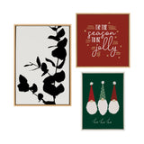 Three framed art prints: black silhouette of leaves on white background, red print with "'tis the season to be jolly" in white script, and green print with three gnome heads wearing patterned red and green hats.