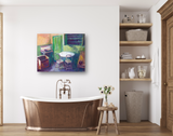 Abstract painting above a bronze freestanding bathtub in a bright bathroom, featuring bold green, purple, and peach colors with a round table and chairs scene.