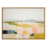 Abstract landscape painting with soft pastel fields in pink, yellow, and green, under a pale sky with a few small tree shapes in the distance, framed in light wood.