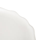 Curved edge detail of a smooth white decorative tray with gently scalloped contours on a white background