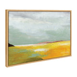 Abstract landscape painting with broad golden yellow field under pale blue and gray sky, framed in light wood and angled slightly to show depth.