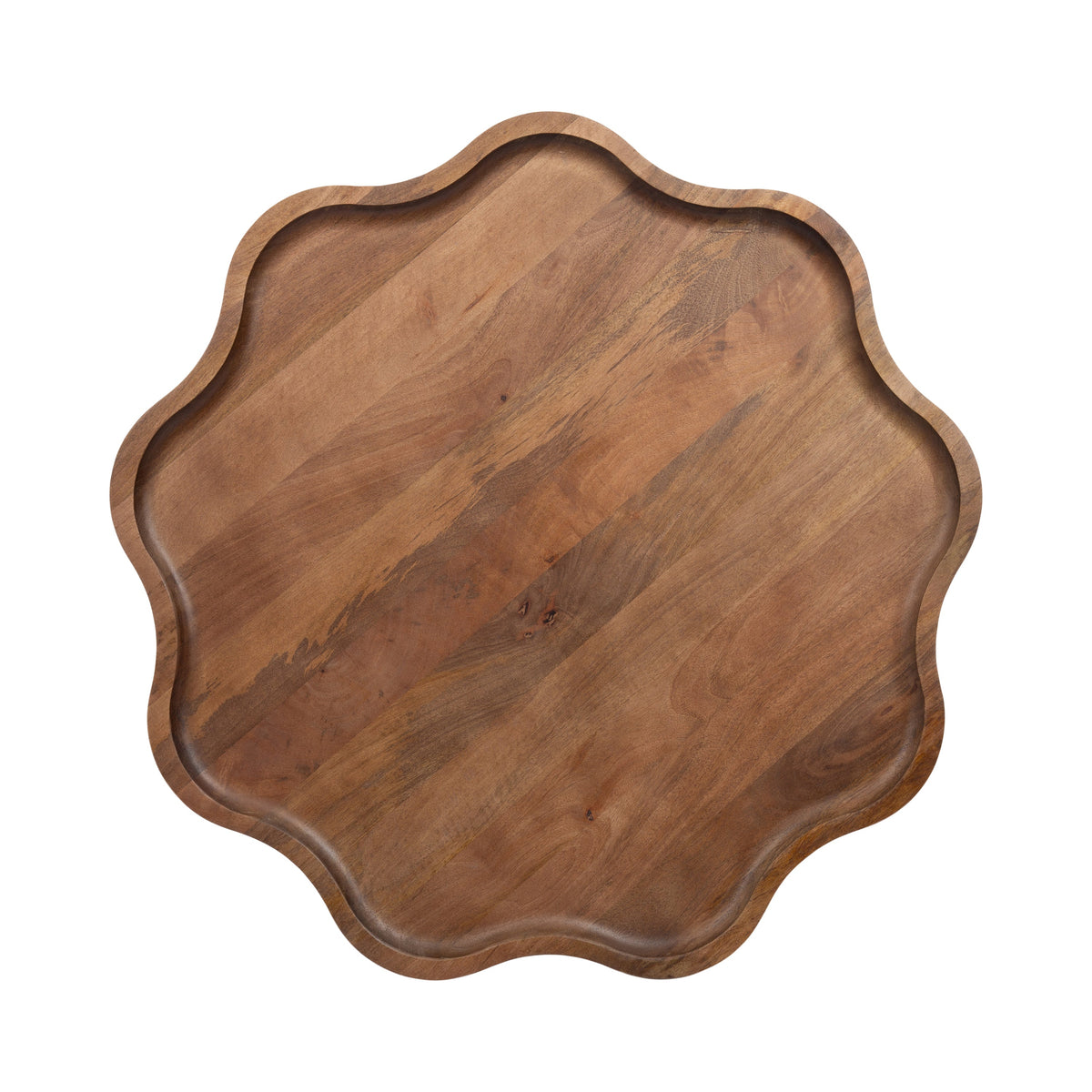Top view of a round wooden tray with a scalloped edge and smooth grain pattern in warm brown tones.