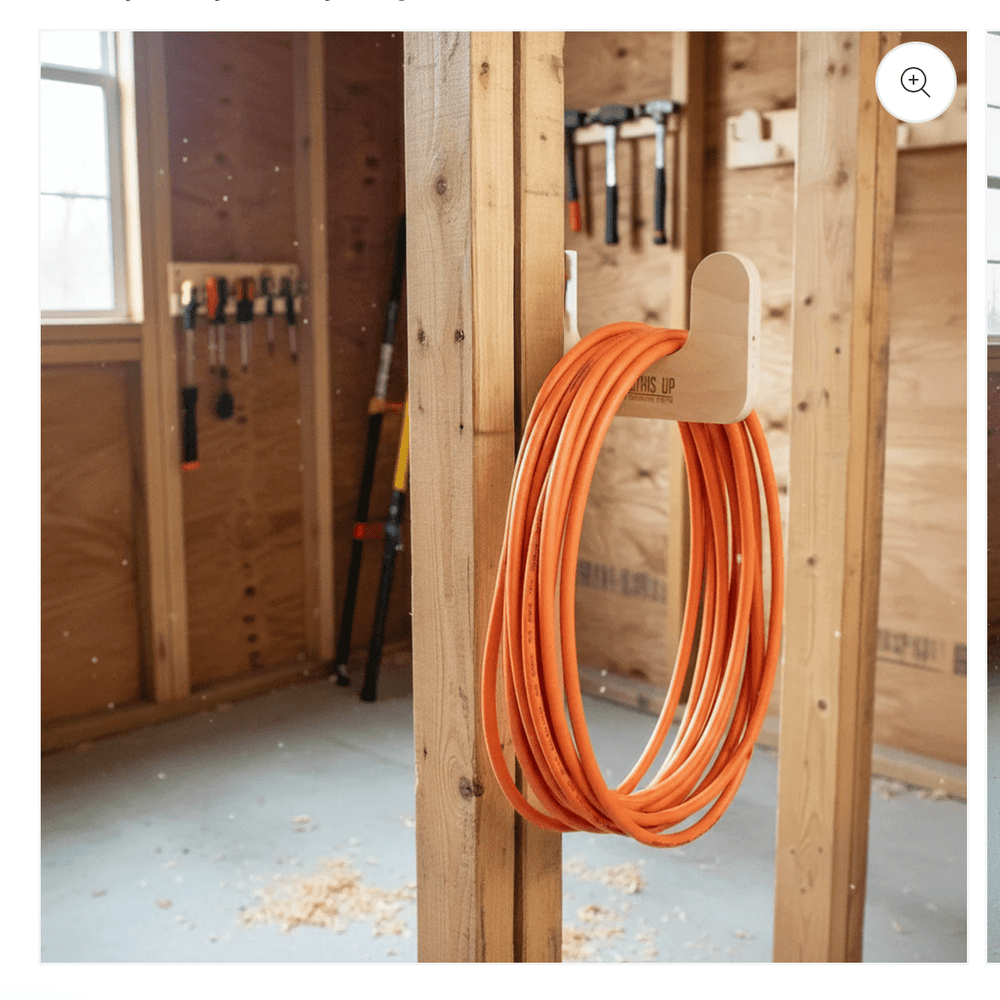 Multi-Purpose Utility Organizer Hooks mounted on shed wall with yard tools stored