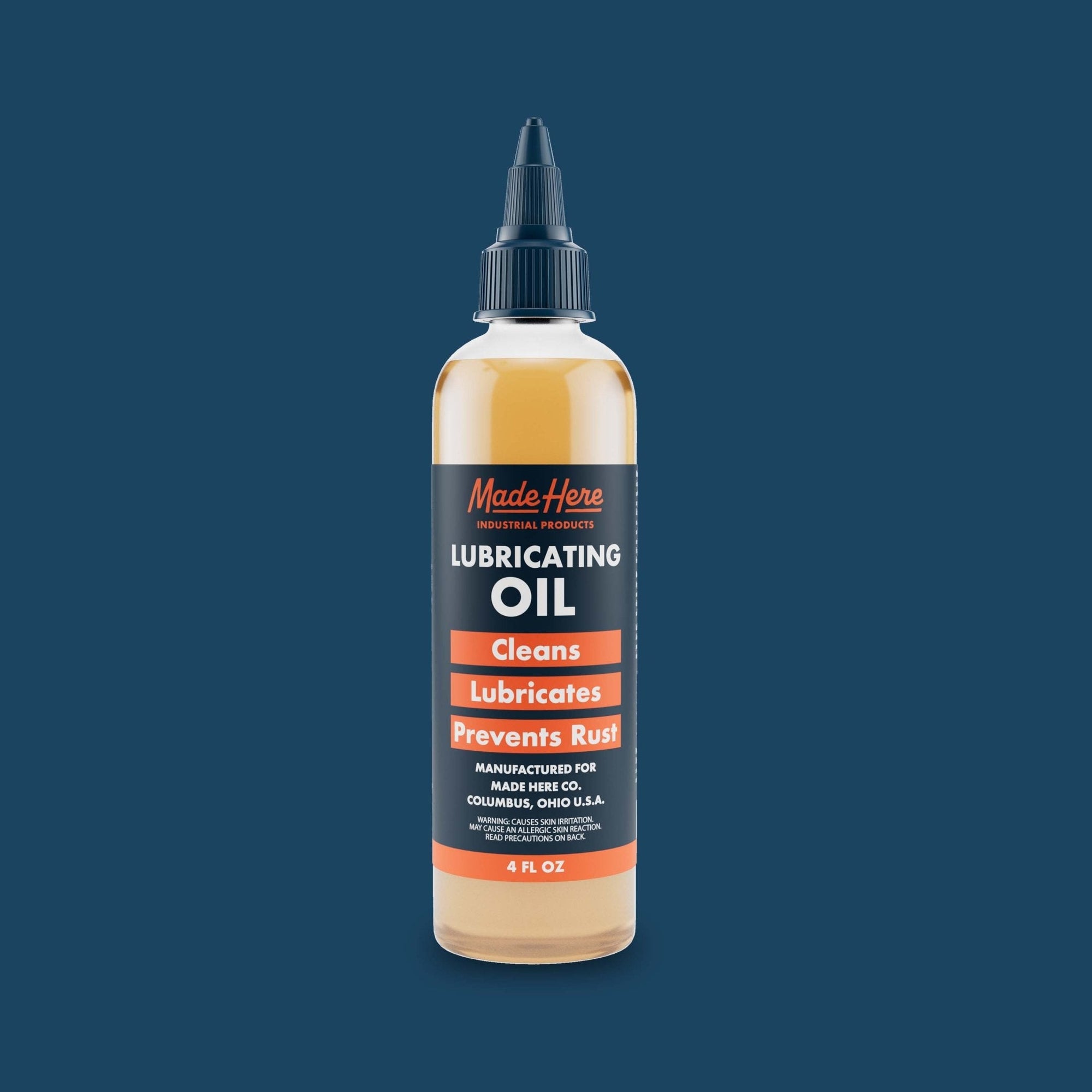 Bottles of Multi-use Lubricating Oil with precision applicator tips.