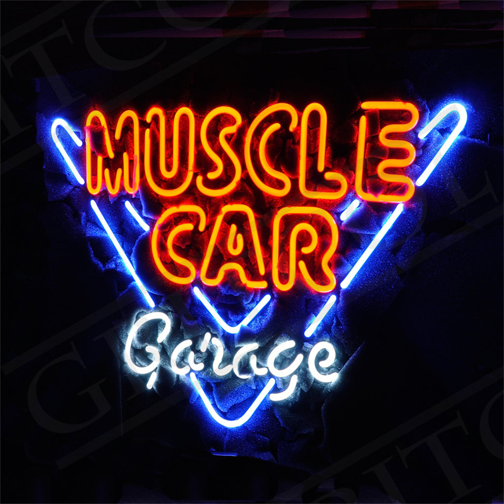 Neon sign with red 'MUSCLE CAR' text inside a blue outlined V shape and white cursive word 'Garage' below, all against a dark background.