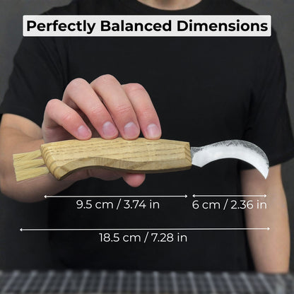Mushroom knife with carbon steel blade, ash wood handle, and built-in brush, shown with leather sheath