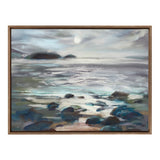 Framed painting of a moonlit seascape with glowing waves, distant dark islands, and scattered rocks in the foreground under a cloudy sky.