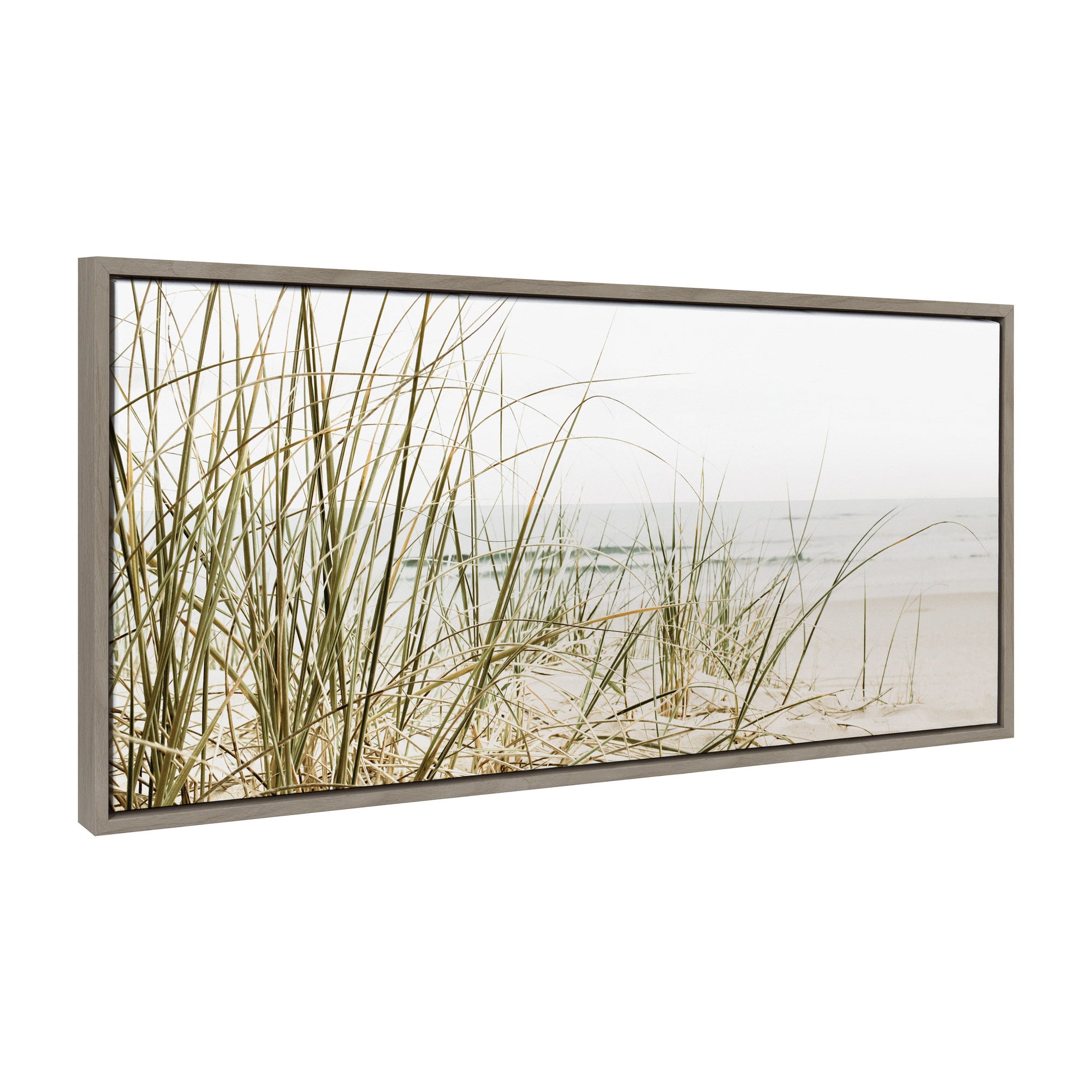 Framed canvas art showcasing calm beach grass in neutral colors with a modern floating frame
