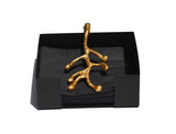 Vibhsa Golden Olive Bud Napkin Holder on dining table highlighting golden flower bud detail