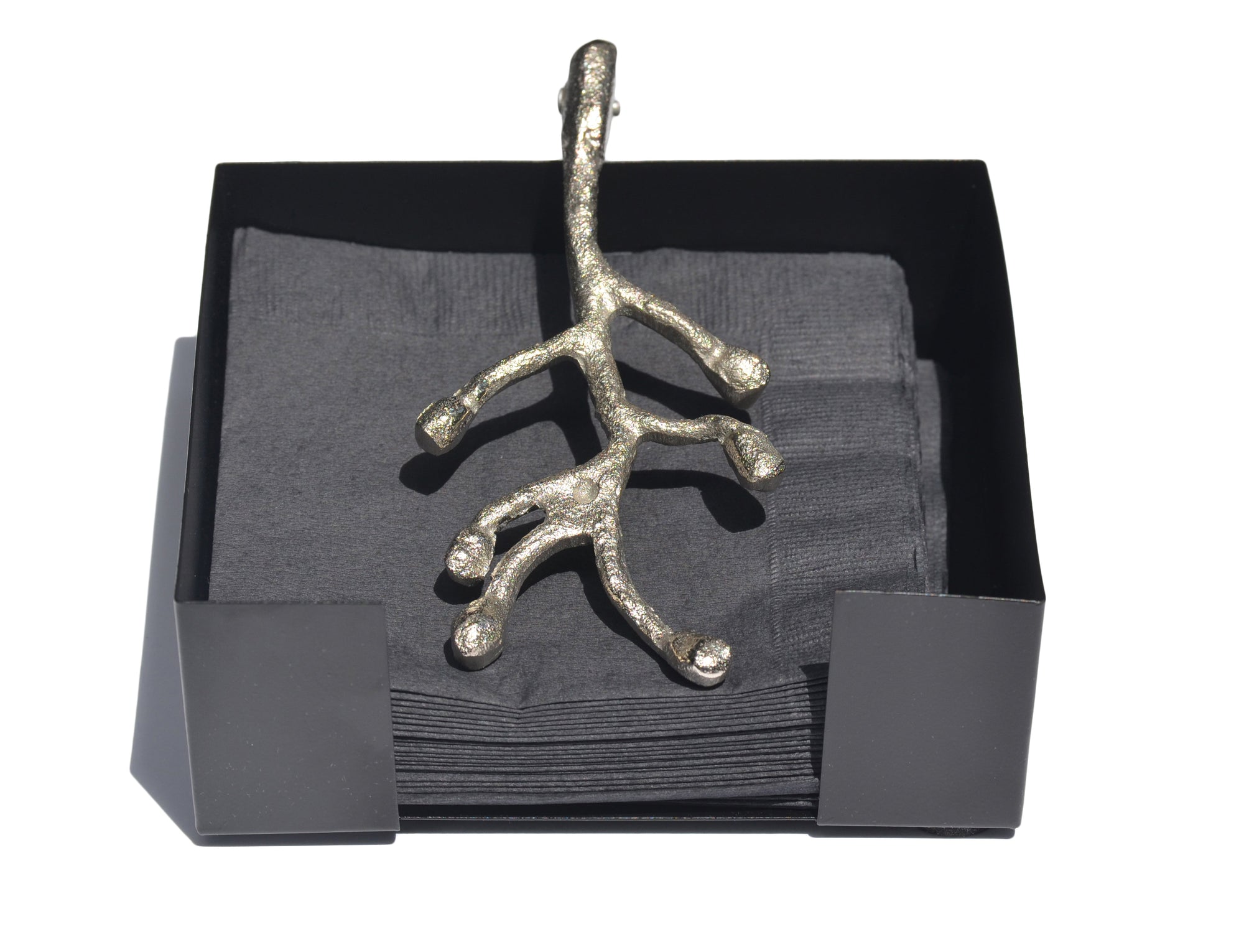 Silver Vibhsa Napkin Holder with antique flower bud design on a dining table