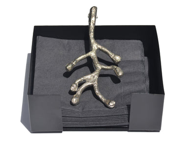Silver Vibhsa Napkin Holder with antique flower bud design on a dining table