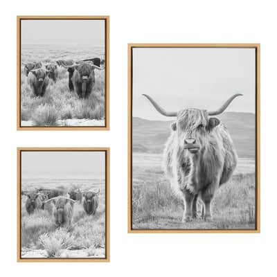 Three-piece framed black and white canvas art set featuring herds of Highland cows and mountain landscape by The Creative Bunch Studio