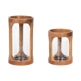 Two wooden candle holders with cylindrical clear glass inserts, one taller and one shorter, both featuring smooth, rounded wood frames with visible grain.