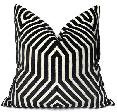Vanderbilt Pillow Cover in noir black velvet on a sofa