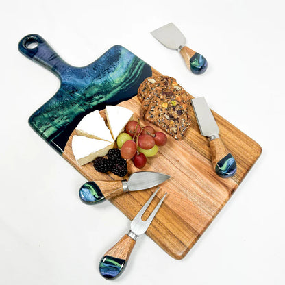 Wooden resin charcuterie board cheeseboard set with marble handles on a white background