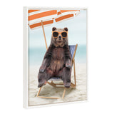 Sylvie Beaded Beach Chair Bear framed canvas art depicting a bear seated in a beach chair with a vintage beaded frame