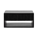 Black rectangular side table with a floating top and ribbed front edge, featuring open storage space underneath in a boxy design.