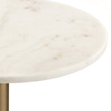 Close-up of a smooth, light beige marble table edge with subtle warm veining, supported by a cylindrical brass-colored metal leg on a white background.