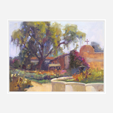 Impressionistic painting of a sunlit garden with large leafy trees, colorful flowers, and adobe buildings, featuring a cross on one roof under a soft sky.