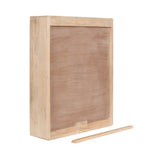Rectangular light wood box with a flat back and four framed edges, photographed against white background, with a thin wooden rod placed in front.