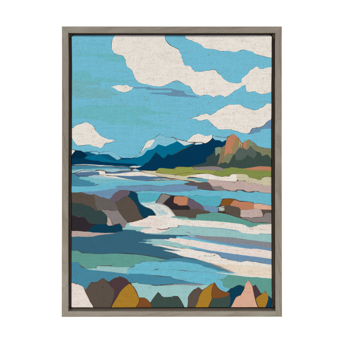 Framed canvas artwork depicting a stylized coastal scene with blue sky, scattered clouds, mountains, and a flowing river or ocean waves with colorful rocks in the foreground.