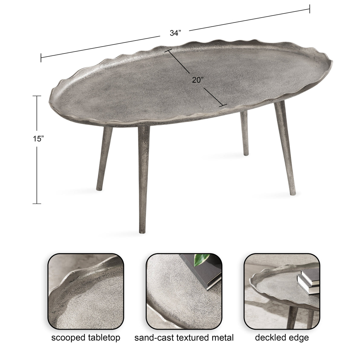 Oval coffee table with a 34-inch sand-cast textured metal tabletop featuring a scooped surface and deckled edge, supported by four tapered legs, 15 inches tall.