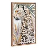 Profile painting of a cheetah with blue eyes surrounded by stylized beige and gray tropical leaves on a framed canvas.