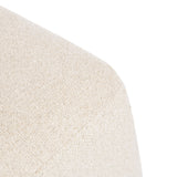 Close-up of a rounded corner on beige woven fabric upholstery with a subtle textured pattern, showing a smooth, continuous seam against a white background.