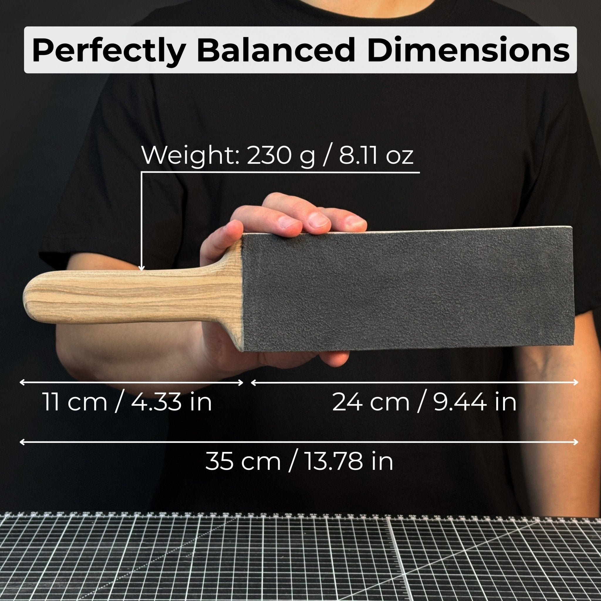 One-sided leather strop with oak base and green polishing compound for knife sharpening