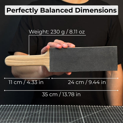 One-sided leather strop with oak base and green polishing compound for knife sharpening