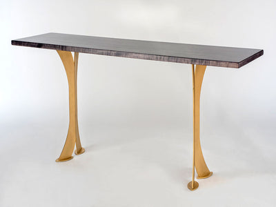 Split Leg Sofa Table with black stained Tiger Maple top and matte gold split steel legs