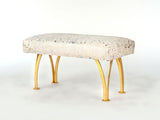 32″ Split Leg Bench with white hair on hide upholstery and matte gold steel split legs