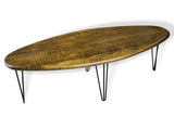 Mid Century Surfboard Table with Hairpin Legs in Acid Orange finish with black steel legs