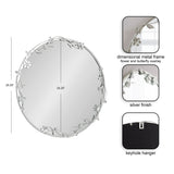 Round wall mirror with a dimensional silver metal frame featuring floral and butterfly decorations around the edge, including keyhole hanger on the back.