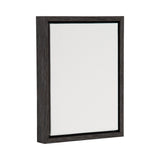 Vertical blank white canvas stretched on a dark wood frame with visible wood grain, shown angled against a white background.