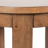 Close-up of Foxford round wood side table's edge and leg showing smooth, light brown wood grain and natural wood knots under soft lighting.