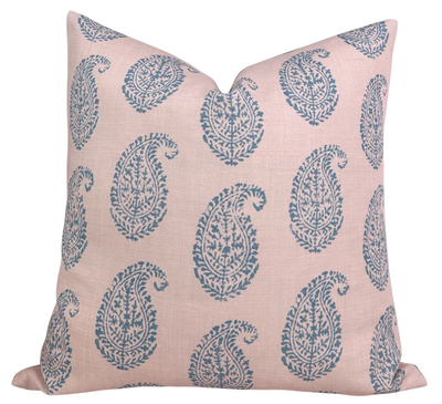 Kashmir Paisley Pillow Cover in Pink and Blue shown on a sofa with ivory linen backing