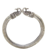 Close-up image of Antique Norse Peacock Head Viking Bracelet showing detailed dotted pattern and peacock heads.