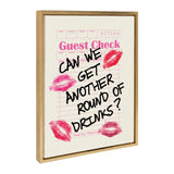 Framed canvas print of a pink guest check with handwritten black text reading 'Can we get another round of drinks?' and four red lipstick kiss marks around the text.