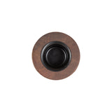Top view of a round candle holder with a dark central cup and a textured brown outer ring