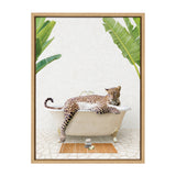Leopard lounging in a vintage clawfoot bathtub with green banana leaves framing the beige textured wall background.