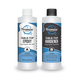 Two white plastic bottles labeled Promise Epoxy Table-Top Epoxy and Hardener, each 8 oz, with blue and black accents and safety warnings on front labels.
