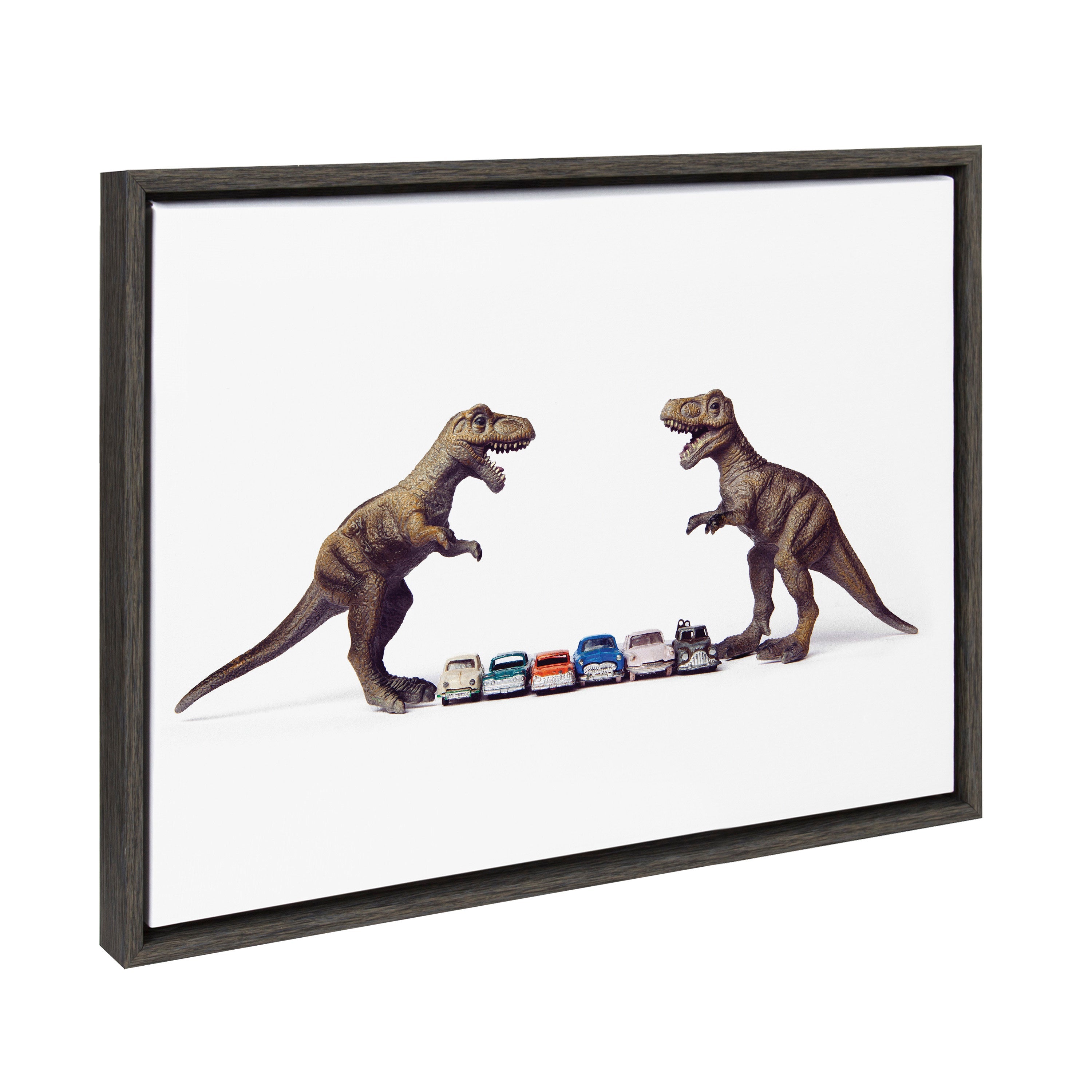 Sylvie Dino Cars Faceoff framed canvas showing colorful toy cars surrounded by dinosaurs